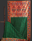 Traditional saree with intricate patterns on a white background