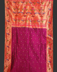 Saree with pink and orange border and purple center