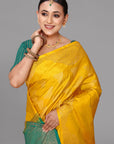 Yellow self zari soft silk saree
