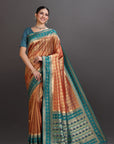 Woman wearing a traditional saree with a gradient design on a gray background