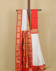 White by red silk paithani saree