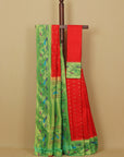 Red by green fancy border silk paithani saree