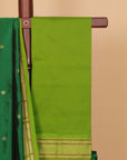 Green by Liril paithani saree