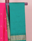Rani pink by green paithani saree