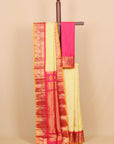 Lemon by red small zari checks gadhwal silk saree
