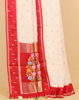 Ivory cream by maroon viscose crepe saree