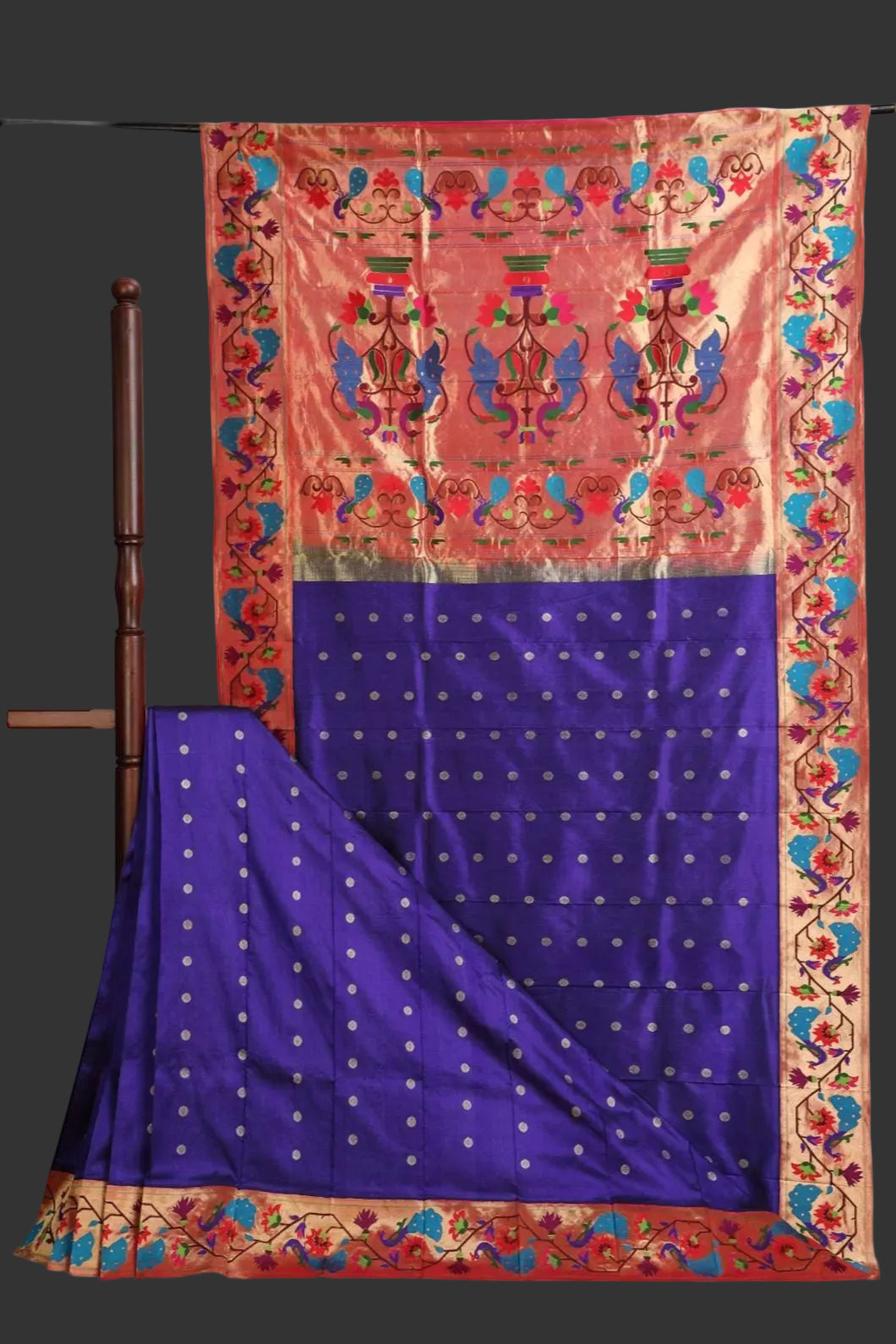 Paithani Saree with a pink and blue design on a white background