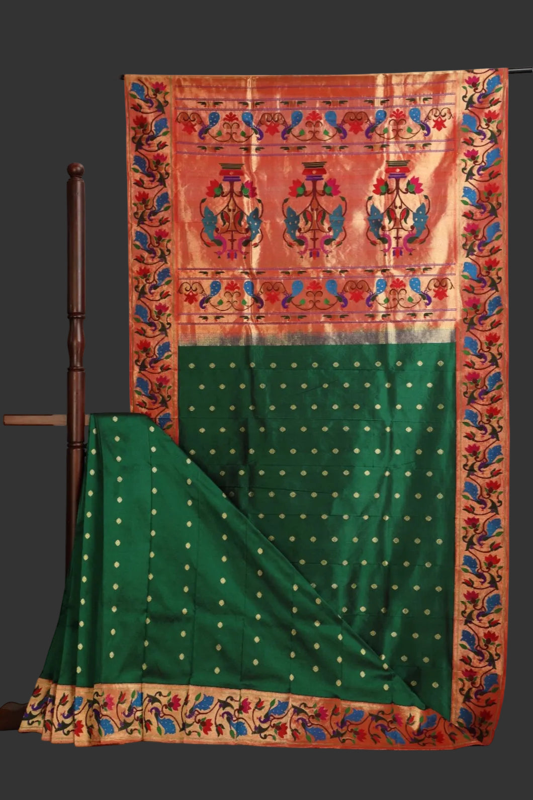 Traditional saree with intricate patterns on a white background