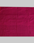 Pink saree with a decorative border on a white background