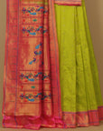 Parrot by pink munia paithani saree
