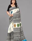 Cream by black skirt border printed silk saree