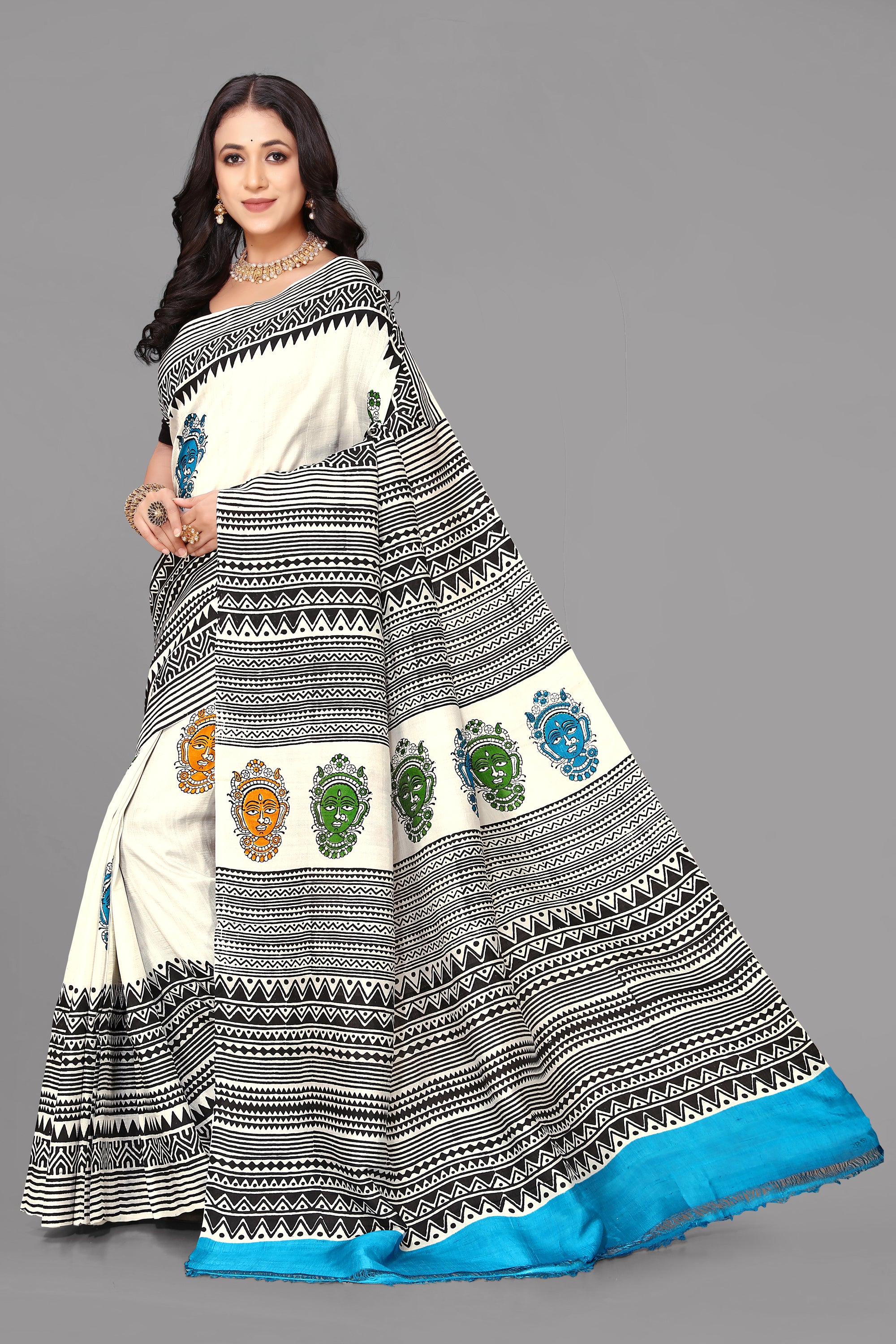 Cream by black skirt border printed silk saree