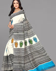 Cream by black skirt border printed silk saree