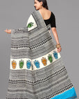 Cream by black skirt border printed silk saree