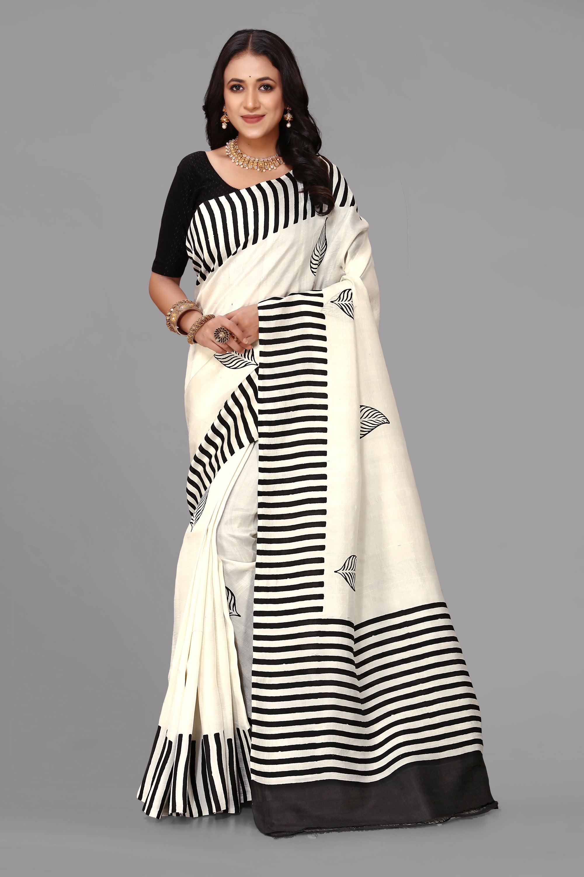 Cream by black stripe border printed silk saree