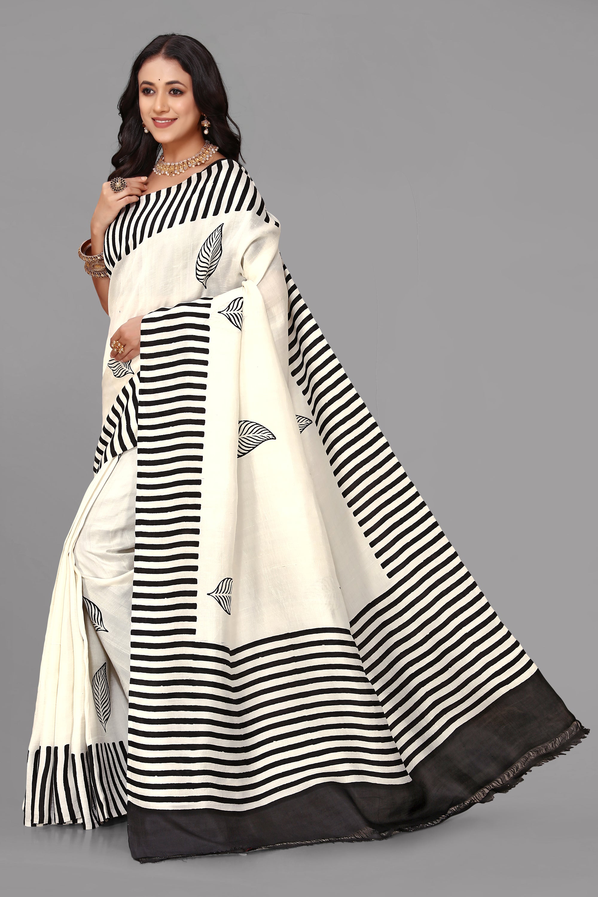 Cream by black stripe border printed silk saree