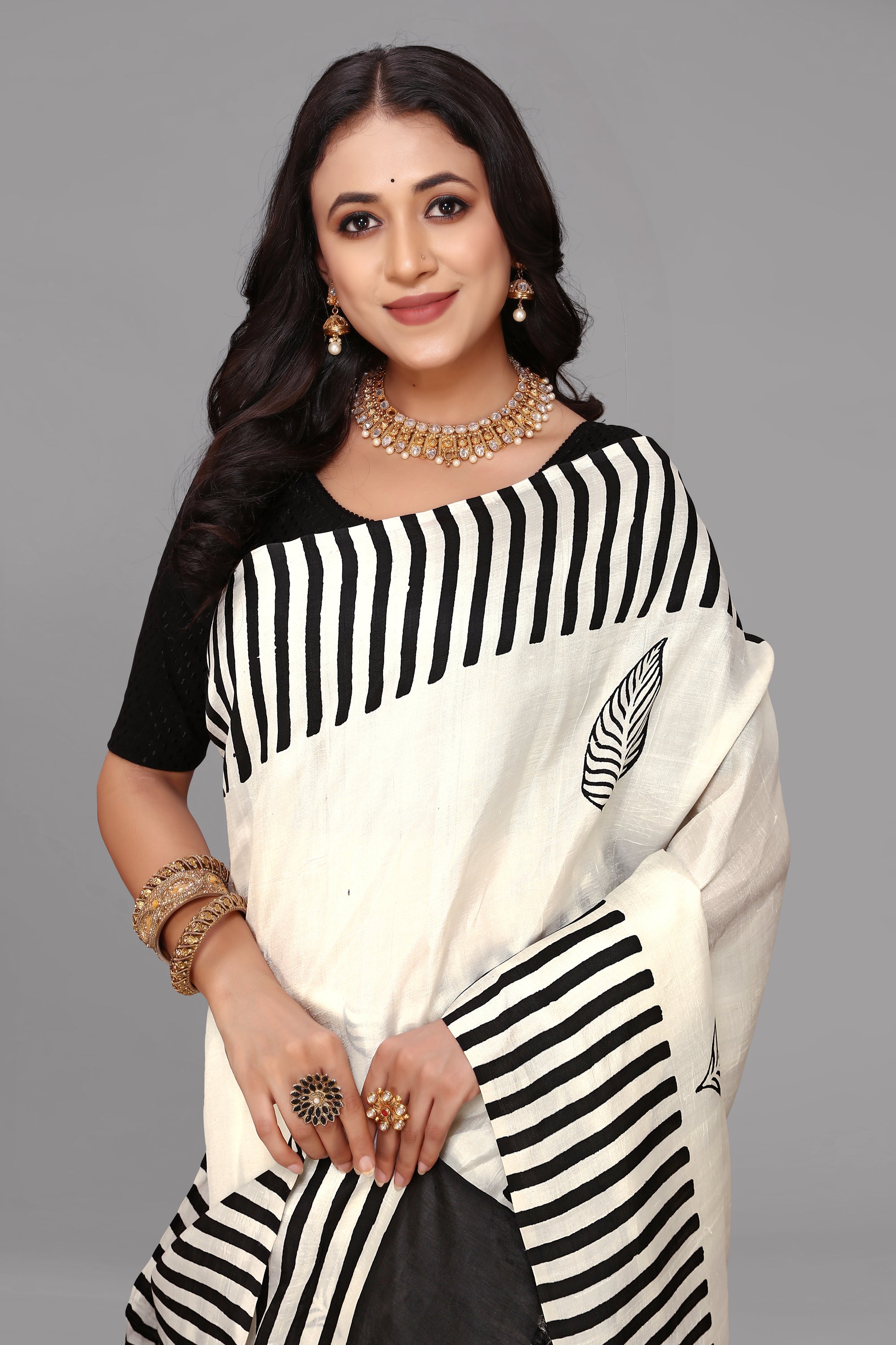 Cream by black stripe border printed silk saree