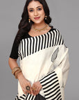 Cream by black stripe border printed silk saree