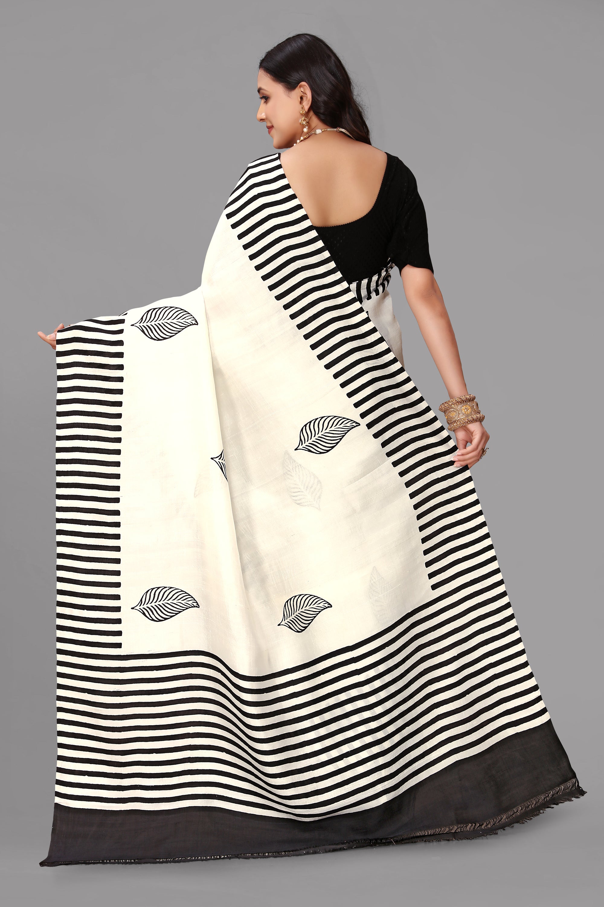 Cream by black stripe border printed silk saree