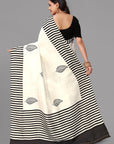 Cream by black stripe border printed silk saree