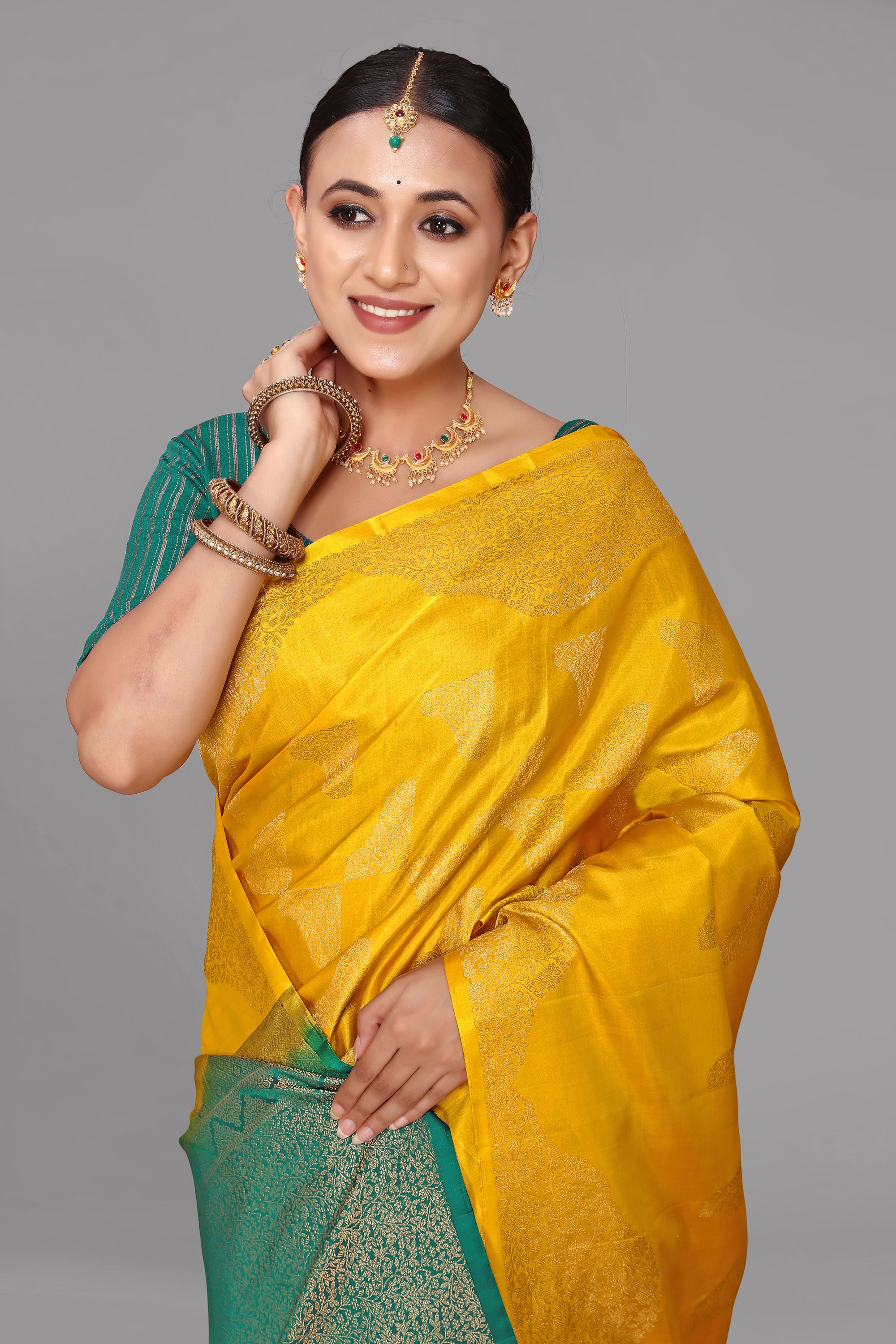 Yellow self zari soft silk saree
