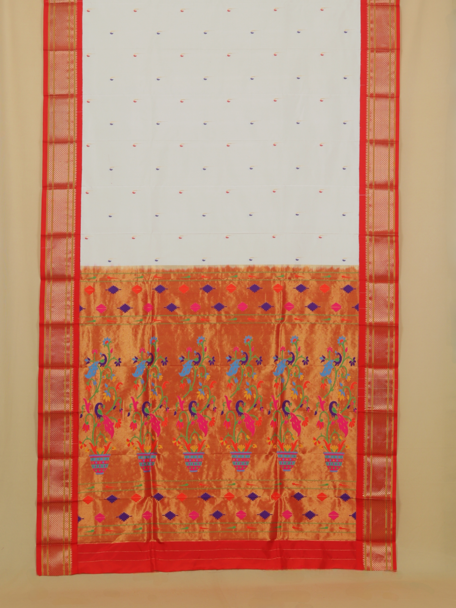 White by red silk paithani saree