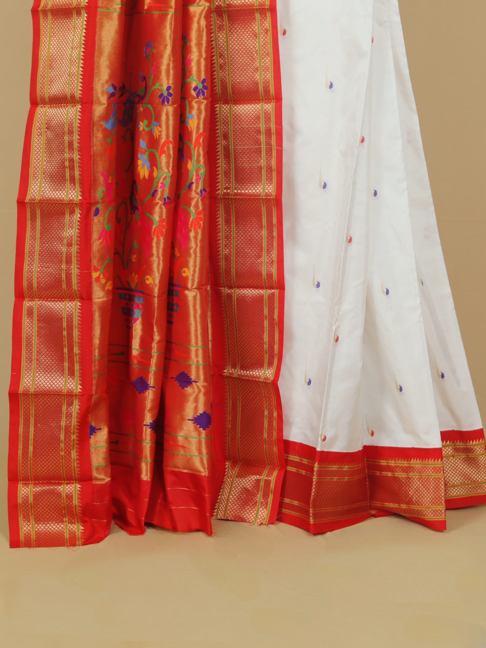White by red silk paithani saree