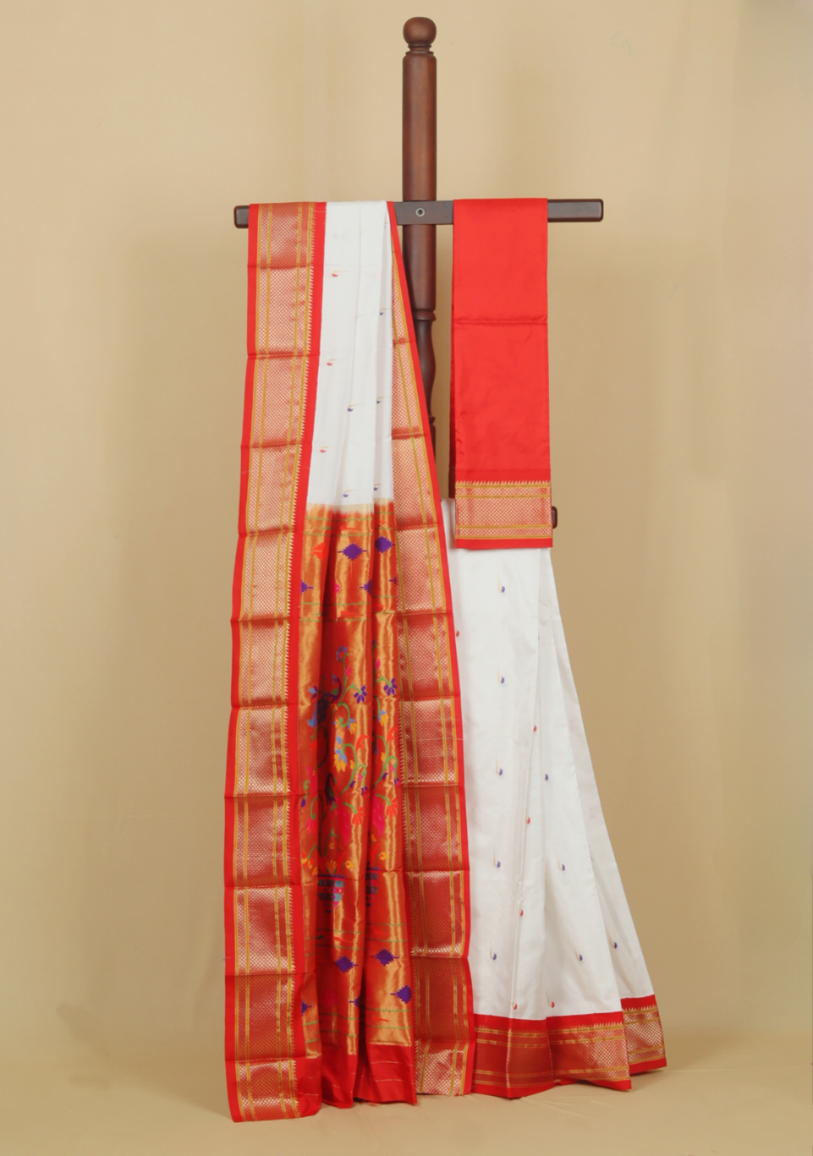 White by red silk paithani saree