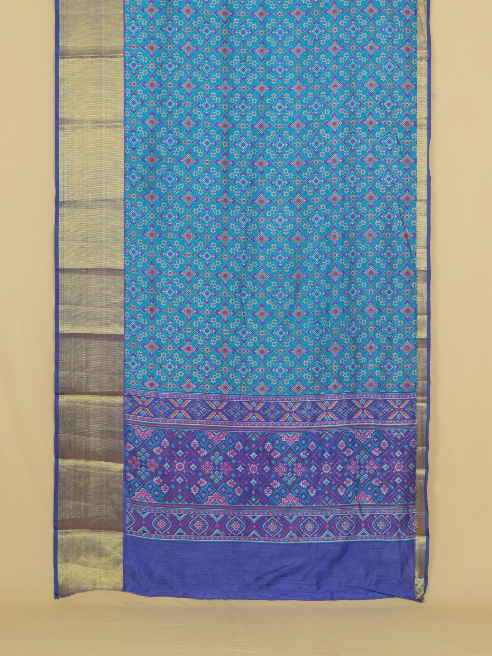Peacock blue ikkat printed saree