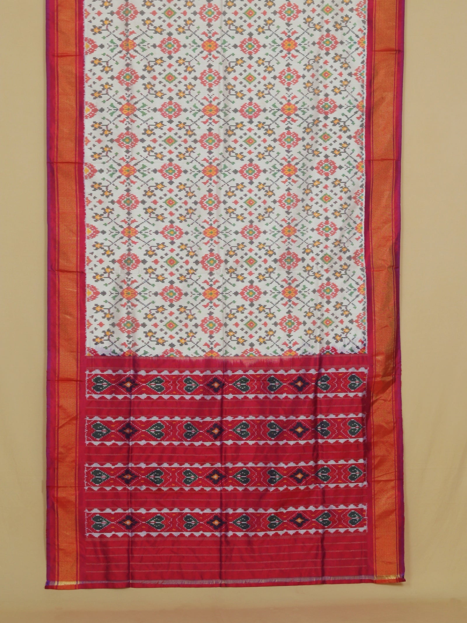 White silk ikat patola saree