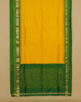 Mango yellow silk ikat patola saree