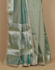 Teal green organza saree