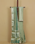 Teal green organza saree