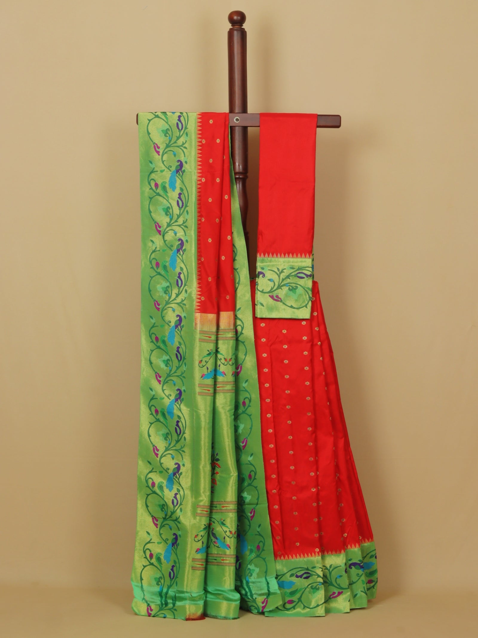 Red by green fancy border silk paithani saree