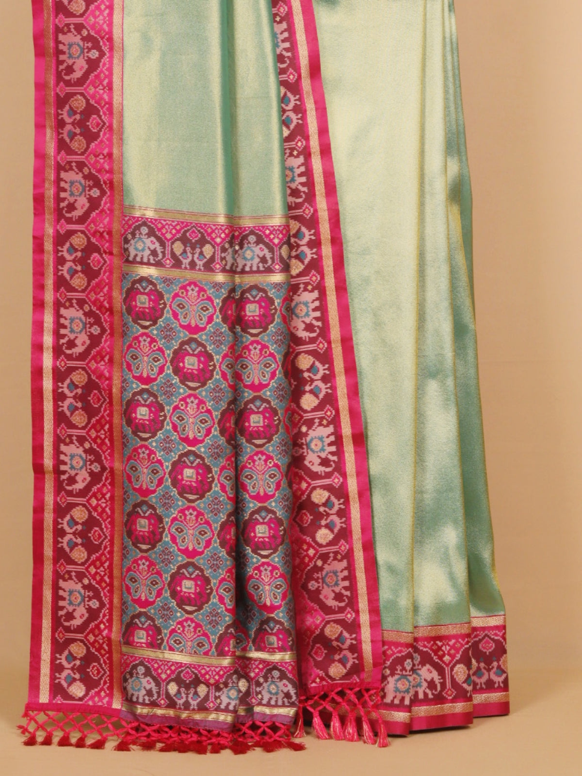 Mint Green with Magenta Patola Border Tissue Silk Saree