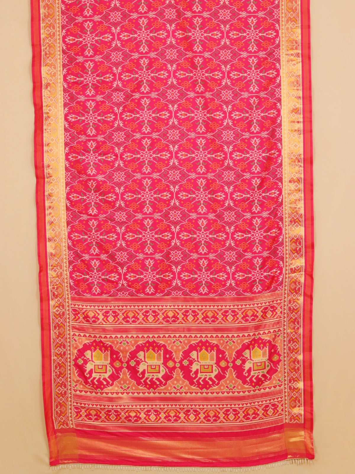 Rani pink self rajkot ikat patola saree