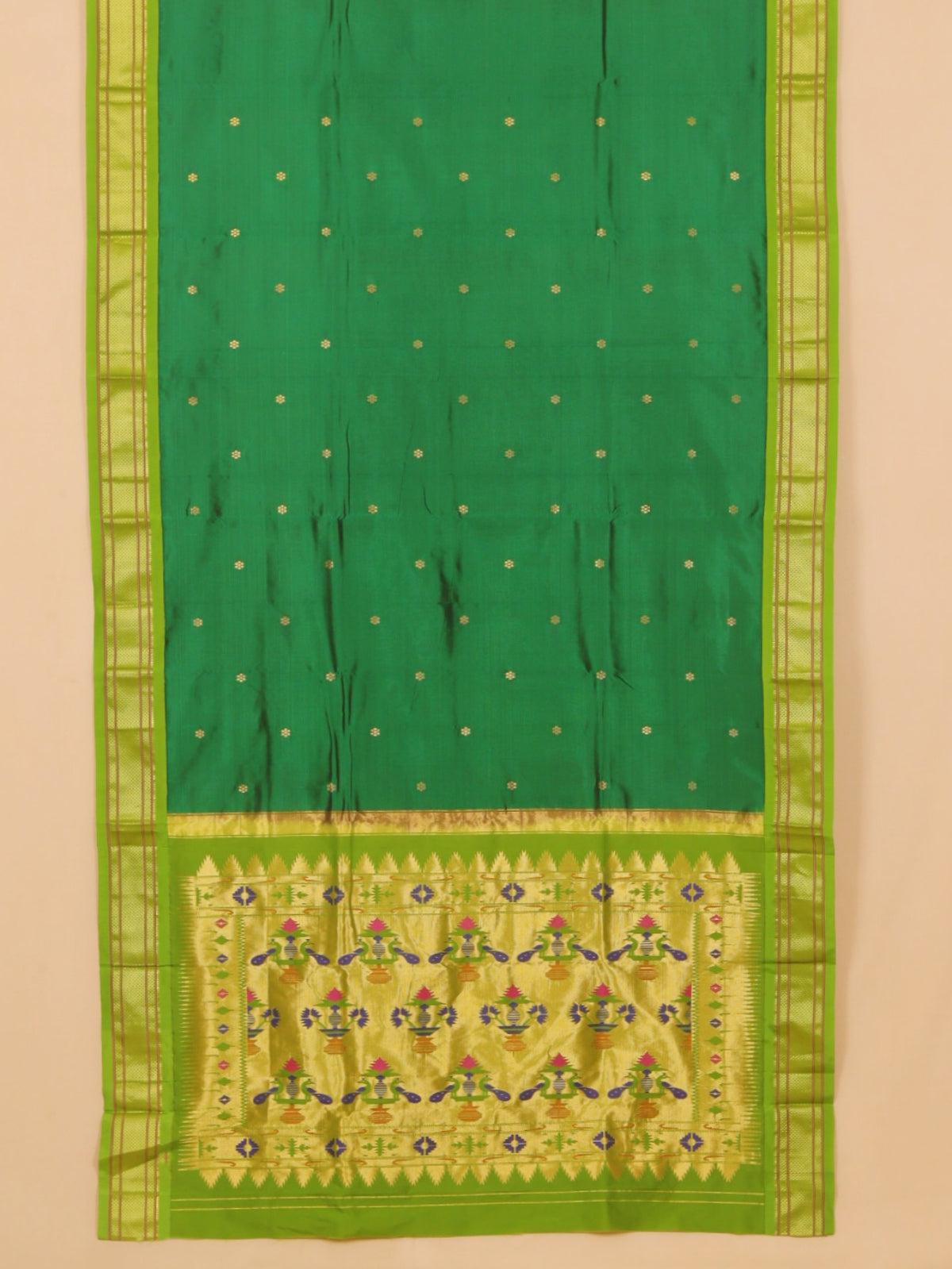 Green by Liril paithani saree