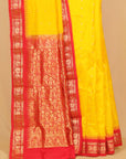 Lemon yellow by red gadhwal saree