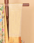 Cream paithani tissue all over resham woven saree