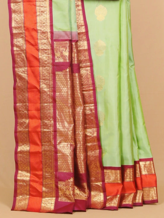 Pista green by wine gadhwal silk saree