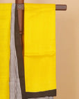 Cream by yellow printed silk saree